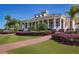 Elegant clubhouse with columns and landscaping at 2971 Camden Way, Davenport, FL 33837