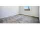 Well-lit bedroom featuring carpet flooring and a window with a view at 2971 Camden Way, Davenport, FL 33837