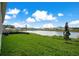 Backyard view of a lake and neighborhood at 2971 Camden Way, Davenport, FL 33837