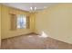 Bedroom with window, carpet and ceiling fan at 3401 Home Town Ln, St Cloud, FL 34769