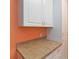 Laundry room with white cabinets and countertop at 3401 Home Town Ln, St Cloud, FL 34769