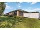 Brick home with screened patio and fenced yard at 3401 Home Town Ln, St Cloud, FL 34769