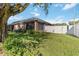 Brick home with screened porch and fenced backyard at 3401 Home Town Ln, St Cloud, FL 34769