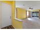 Spacious living room with carpeting, neutral walls, and access to a patio at 3401 Home Town Ln, St Cloud, FL 34769