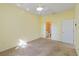 Bedroom with ensuite bathroom access and carpet at 3401 Home Town Ln, St Cloud, FL 34769