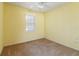Spacious bedroom with neutral decor and carpet at 3401 Home Town Ln, St Cloud, FL 34769