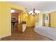 Kitchen with dark countertops, wooden cabinets, and island at 3401 Home Town Ln, St Cloud, FL 34769