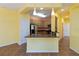 Kitchen features dark wood cabinets and a breakfast bar at 3401 Home Town Ln, St Cloud, FL 34769
