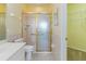 Clean bathroom with shower, toilet and vanity at 3401 Home Town Ln, St Cloud, FL 34769