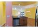 Kitchen island with stainless steel dishwasher and sink at 3401 Home Town Ln, St Cloud, FL 34769