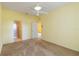 Bedroom with ensuite bathroom and carpet flooring at 3401 Home Town Ln, St Cloud, FL 34769