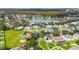 Wide aerial view of a neighborhood near a lake and conservation area at 3804 Marietta Way, St Cloud, FL 34772