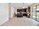 Modern kitchen with dark cabinetry and tile flooring at 3804 Marietta Way, St Cloud, FL 34772