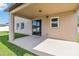 Covered patio with sliding glass doors, offering an outdoor living space at 3804 Marietta Way, St Cloud, FL 34772