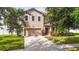 Two story house with a two car garage and nicely landscaped yard at 3804 Marietta Way, St Cloud, FL 34772