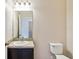 Simple bathroom with single vanity and toilet at 3804 Marietta Way, St Cloud, FL 34772