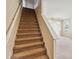 Carpeted staircase leading to the second floor at 3804 Marietta Way, St Cloud, FL 34772