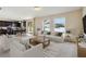 Bright living room with adjacent kitchen and access to backyard at 3804 Marietta Way, St Cloud, FL 34772