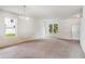 Dining area with carpeted floor and window at 3804 Marietta Way, St Cloud, FL 34772