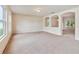 Open living room with archways and neutral tones at 3804 Marietta Way, St Cloud, FL 34772