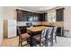 Modern kitchen with dark cabinets and granite counters at 3804 Marietta Way, St Cloud, FL 34772