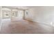 Spacious living room with carpeted floors at 3804 Marietta Way, St Cloud, FL 34772
