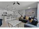 Open floor plan with modern kitchen and comfortable living room at 8912 Sydney Ave, Kissimmee, FL 34747