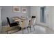Bright dining area with modern table and chairs at 8912 Sydney Ave, Kissimmee, FL 34747