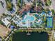 Large community pool, clubhouse, and other amenities at Windsor at Westside at 8912 Sydney Ave, Kissimmee, FL 34747
