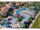 Resort-style pool with water features and lounge area at 8912 Sydney Ave, Kissimmee, FL 34747