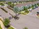 Gated community entrance with landscaping and parking at 8912 Sydney Ave, Kissimmee, FL 34747
