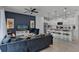 Open concept kitchen and living area with island at 8912 Sydney Ave, Kissimmee, FL 34747