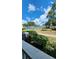 Landscaped grounds with tennis courts and lush greenery at 1025 S Hiawassee Rd # 2216, Orlando, FL 32835