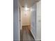 Clean hallway with laminate flooring at 1025 S Hiawassee Rd # 2216, Orlando, FL 32835