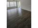Bright living room with grey flooring and large windows at 1025 S Hiawassee Rd # 2216, Orlando, FL 32835