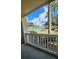 View from balcony showcasing tennis courts and green space at 1025 S Hiawassee Rd # 2216, Orlando, FL 32835