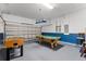 Game room with foosball table and pool table at 131 Cadiz Loop, Davenport, FL 33837