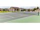 Community tennis court with playground and clubhouse nearby at 131 Cadiz Loop, Davenport, FL 33837