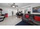 Spacious Gathering room with leather couch and view into kitchen at 136 Alhambra Ave, Altamonte Springs, FL 32714