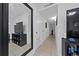 Bright entryway with a large mirror and built-in shelving at 136 Alhambra Ave, Altamonte Springs, FL 32714