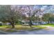 Aerial view of a single-Gathering home with a large backyard and mature trees at 136 Alhambra Ave, Altamonte Springs, FL 32714