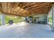 Covered patio with storage and backyard access at 136 Alhambra Ave, Altamonte Springs, FL 32714
