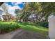 Private backyard with lush landscaping and a spacious patio area at 1423 Farrindon Cir # 1423, Lake Mary, FL 32746