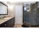 Bathroom with granite countertop and walk-in shower at 1423 Farrindon Cir # 1423, Lake Mary, FL 32746