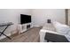 Living room with a sofa and TV at 1423 Farrindon Cir # 1423, Lake Mary, FL 32746