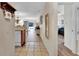 Hallway with views of the kitchen and bedroom at 2216 Mystic Ring Loop, Poinciana, FL 34759