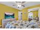 Bedroom with a bed, dresser and window at 2216 Mystic Ring Loop, Poinciana, FL 34759
