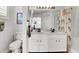 Updated bathroom with double vanity and a shower/tub combo at 2216 Mystic Ring Loop, Poinciana, FL 34759