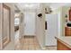 Bright entryway with tile flooring and a view into the living area at 2216 Mystic Ring Loop, Poinciana, FL 34759
