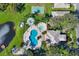 Community pool with a spa and lounge chairs at 2216 Mystic Ring Loop, Poinciana, FL 34759